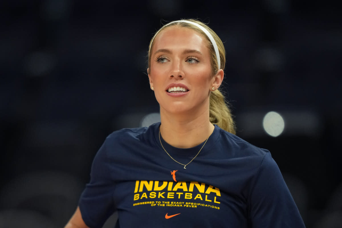 Indiana Fever guard Lexie Hull looks on before a game.© Darren Yamashita-Imagn Images