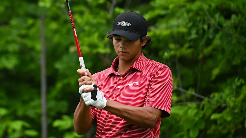 Charlie Woods checks his grip before a shot at the 2025 Junior PGA Championship