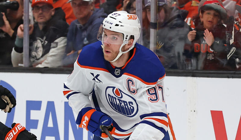 Edmonton Oilers center Connor McDavid (97) controls the puck.