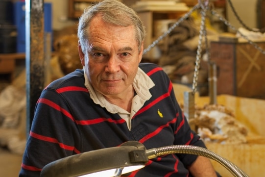 Mike Archer sitting at a table 