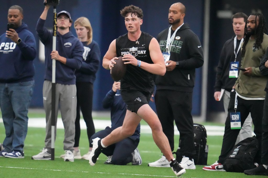 Penn State quarterback Drew Allar (15) runs a drill during the school's NFL football pro day, Wednesday, March 18, 2026, in State College, Pa.