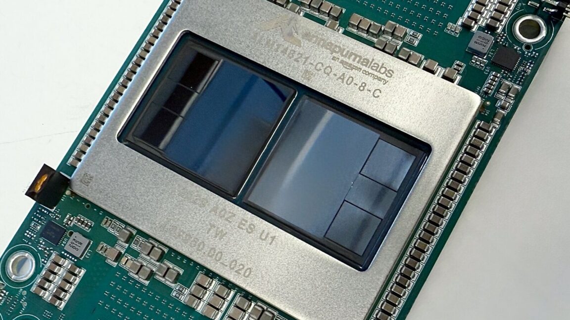 An angled, top-down view of Amazon's Trainium3 chip that is designed to train larger AI models and serve more customers using AI services.