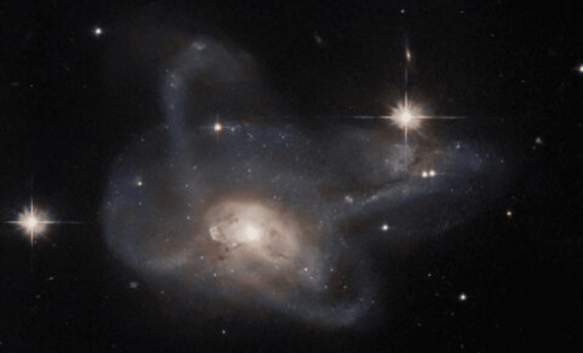 Astronomers Found Evidence Of A Black Hole Collision In Galaxy Ngc 4486b, Offering A Rare Look At Cosmic Mergers