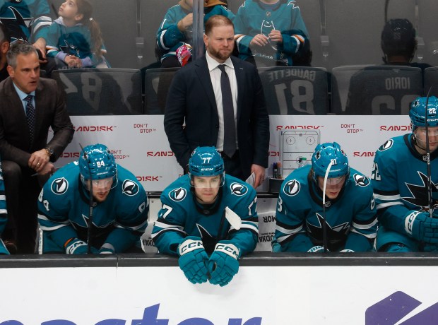 San Jose Sharks head coach Ryan Warsofsky keeps an eye on the game against the Vegas Golden Knights in the second period at the SAP Center in San Jose, Calif., on Sunday, Jan. 11, 2026. (Nhat V. Meyer/Bay Area News Group)