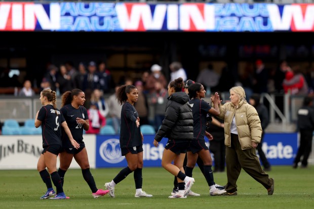 U.S. head coach Emma Hayes, right, high-fives her players after their 2-1 win of an international friendly soccer match against Japan at PayPal Park in San Jose, Calif., Saturday, April 11, 2026. (Ray Chavez/Bay Area News Group)