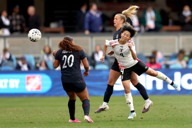 Japan's Riko Ueki (9) is fouled by United States' Claire Hutton (15) during the second half of an international friendly soccer match at PayPal Park in San Jose, Calif., Saturday, April 11, 2026. (Ray Chavez/Bay Area News Group)