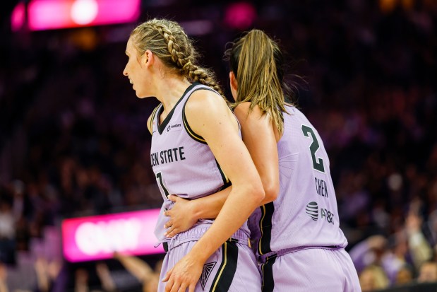 Golden State Valkyries' Miela Sowah (7) falls back on Golden State Valkyries' Kaitlyn Chen (2) after making a three-pointer in the fourth quarter at Chase Center in San Francisco, Calif., on Saturday, April 25, 2026. (Shae Hammond/Bay Area News Group)