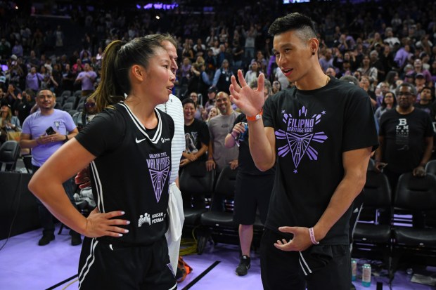Golden State Valkyrie's Kaitlyn Chen (2) chats with former NBA player Jeremy Lin after their WNBA game at Chase Center in San Francisco, Calif., on Saturday, Aug. 30, 2025. The Golden State Valkyries defeated the Washington Mystics 99-62. (Jose Carlos Fajardo/Bay Area News Group)