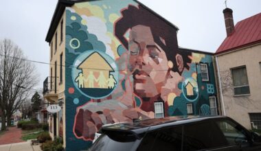 Noah Burns's mural, painted in 2022, is pictured on the former location of the Friends Association on West Chestnut Street. The mural could be removed after the building's new owner put a request before the borough's public arts commission.