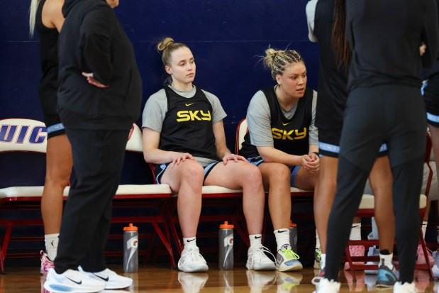 Chicago Sky's Hailey Van Lith, left, and Rachel Banham sit on the bench during a break at practice at UIC Flames Athletic Center on April 20, 2026. (Eileen T. Meslar/Chicago Tribune)
