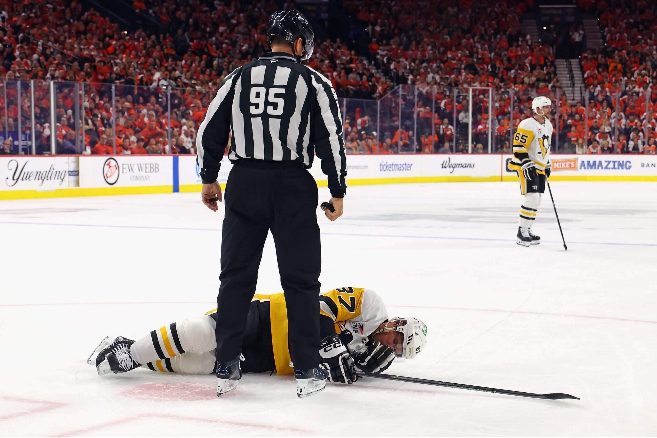 Pittsburgh Penguins Sidney Crosby reacts to a high stick from Garnet Hathaway of the Philadelphia Flyers in Game Three of the teams’ playoff series on April 22, 2026 in Philadelphia.