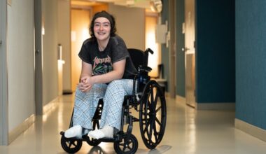 Alexis DiBella, 31, a resident at Public Health Management Corporation’s medical respite facility in West Philadelphia, at the facility in April. DiBella was hospitalized for frostbite while living outside and, after undergoing a partial foot amputation, became a resident at the respite center in January.