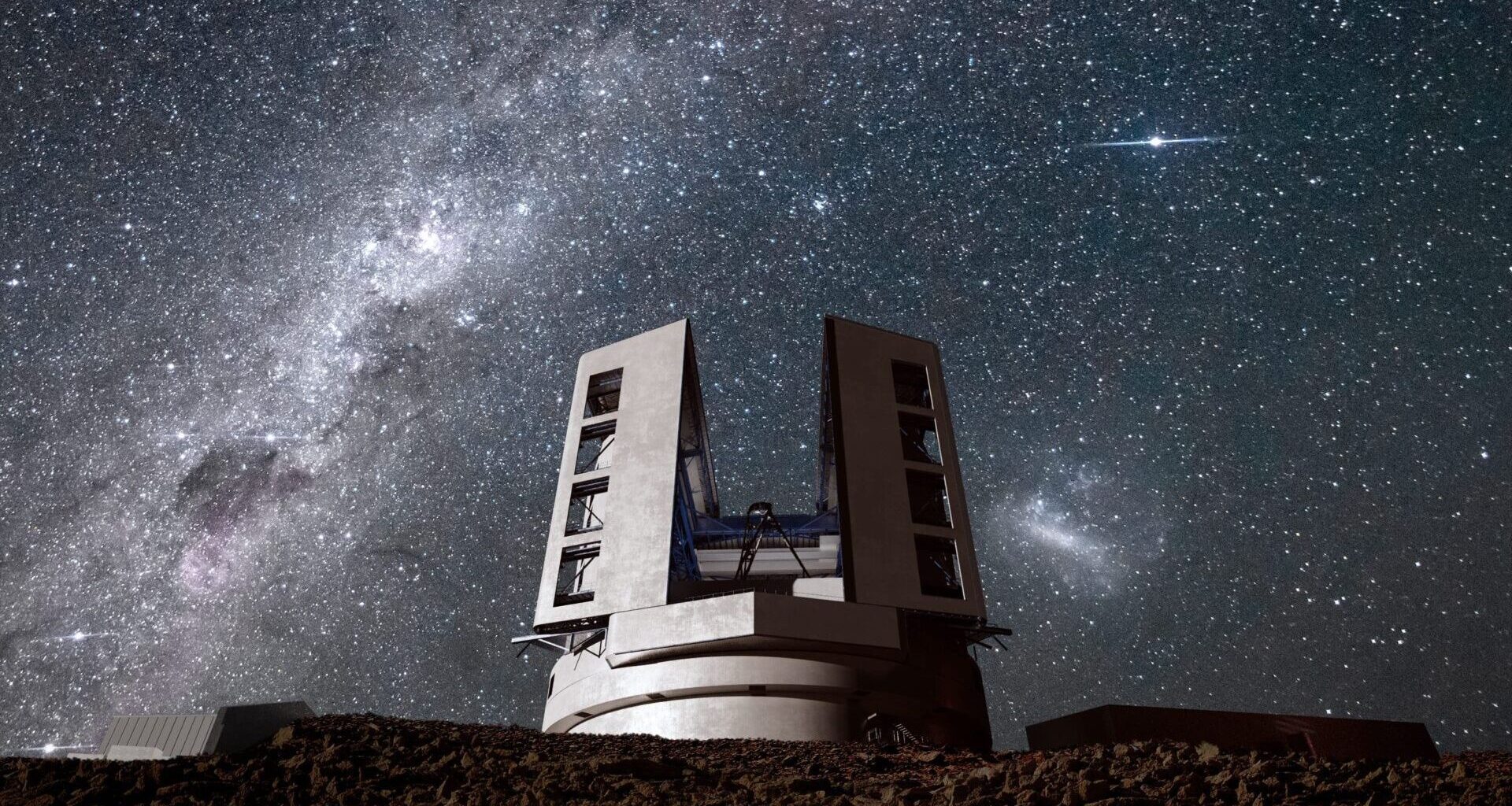A white structure against a very starry sky.