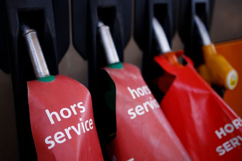 'Out of service' signs on pumps at a petrol station in Romainville, near Paris. Photograph: EPA