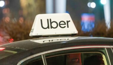 Uber logo on top of car