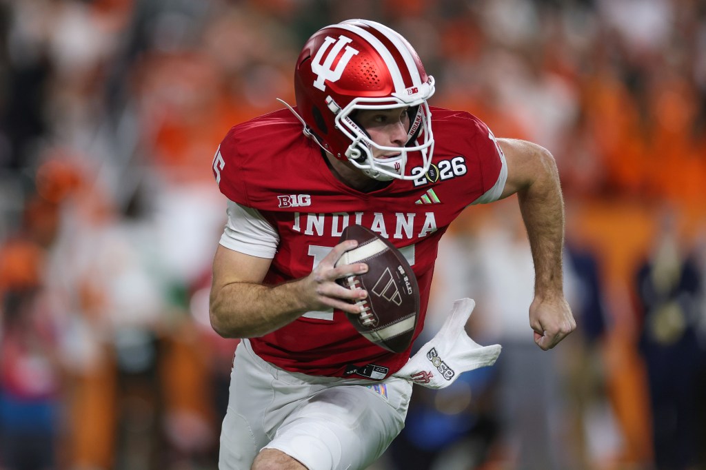 Fernando Mendoza #15 of the Indiana Hoosiers rushes with the ball against the Miami Hurricanes in the 2026 College Football Playoff National Championship at Hard Rock Stadium on January 19, 2026 in Miami Gardens, Florida. 