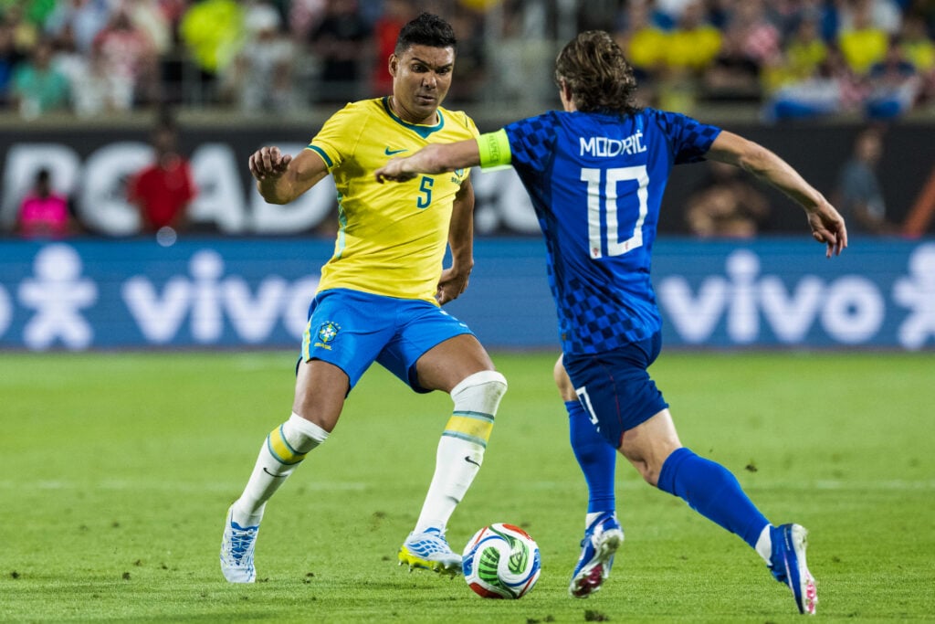 Casemiro faces off against Luka Modric as Brazil play Croatia.