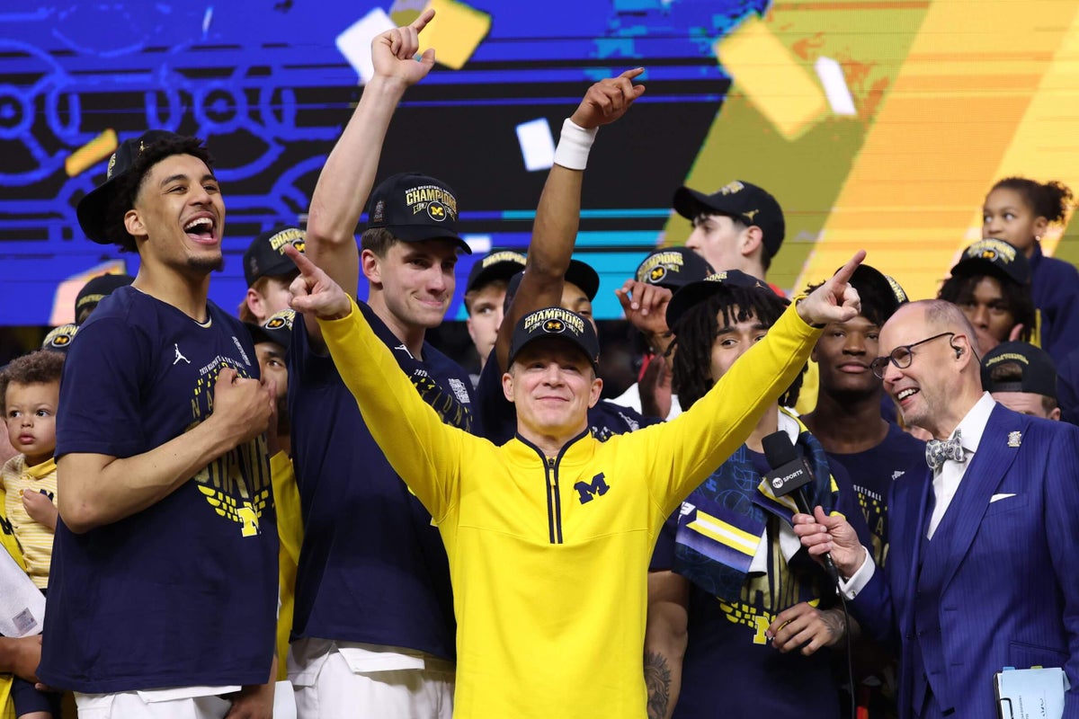Two years ago, Dusty May took over an 8-24 Michigan team. Now, they are national champions
