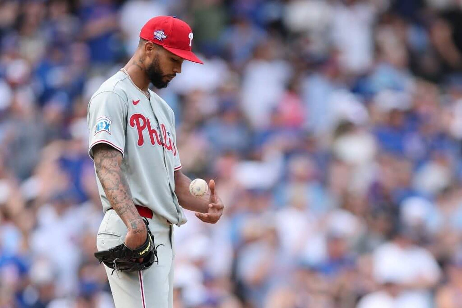 Phillies starter Cristopher Sánchez looks down after allowing a home run to the Cubs.
