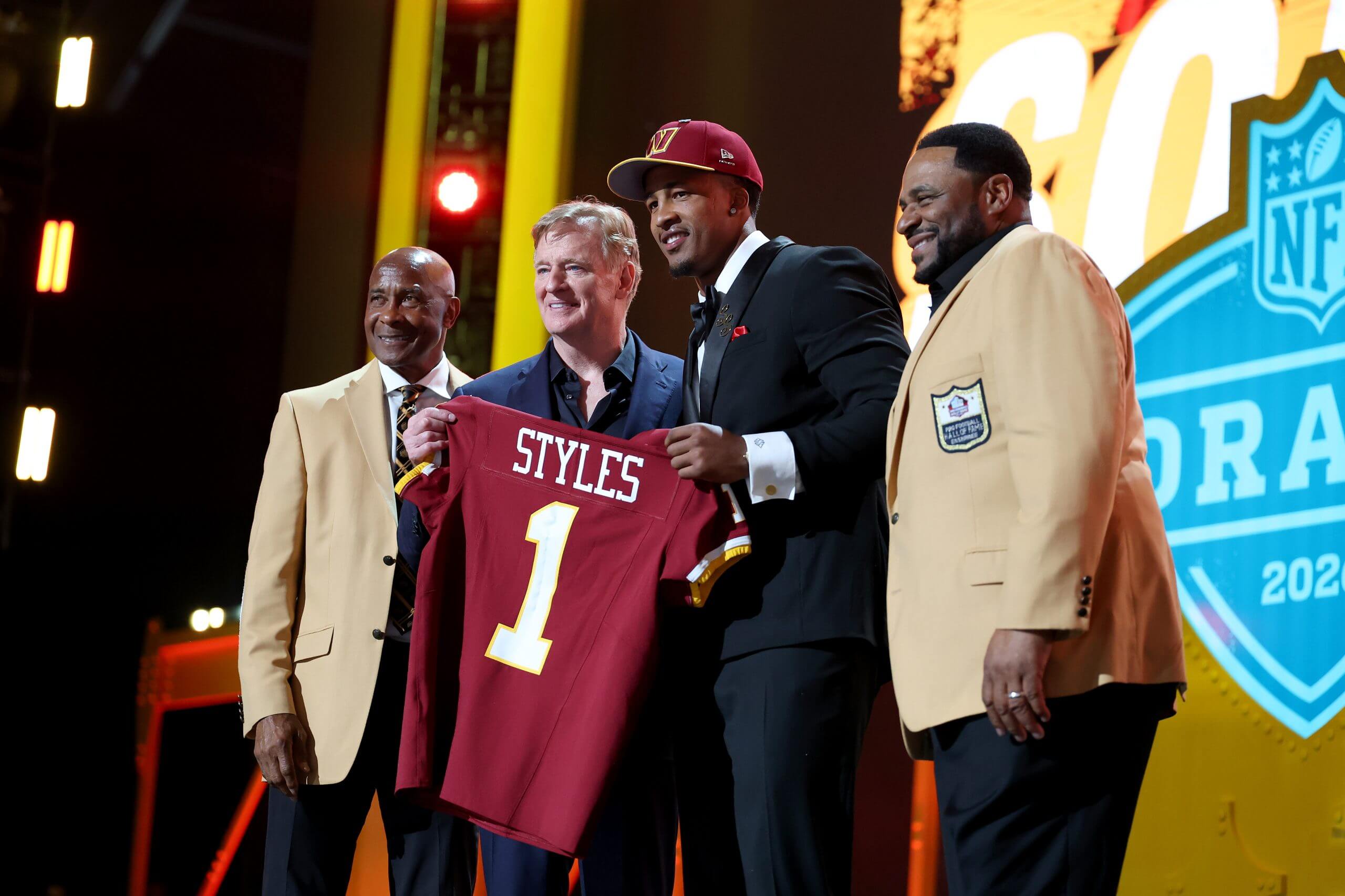 Sonny Styles (2R) of Ohio State poses with NFL Commissioner Roger Goodell (2L), Lynn Swann (L) and Jerome Bettis (R) after being selected seventh overall pick by the Washington Commanders during Round One of the 2026 NFL Draft at Acrisure Stadium on April 23, 2026 in Pittsburgh, Pennsylvania.