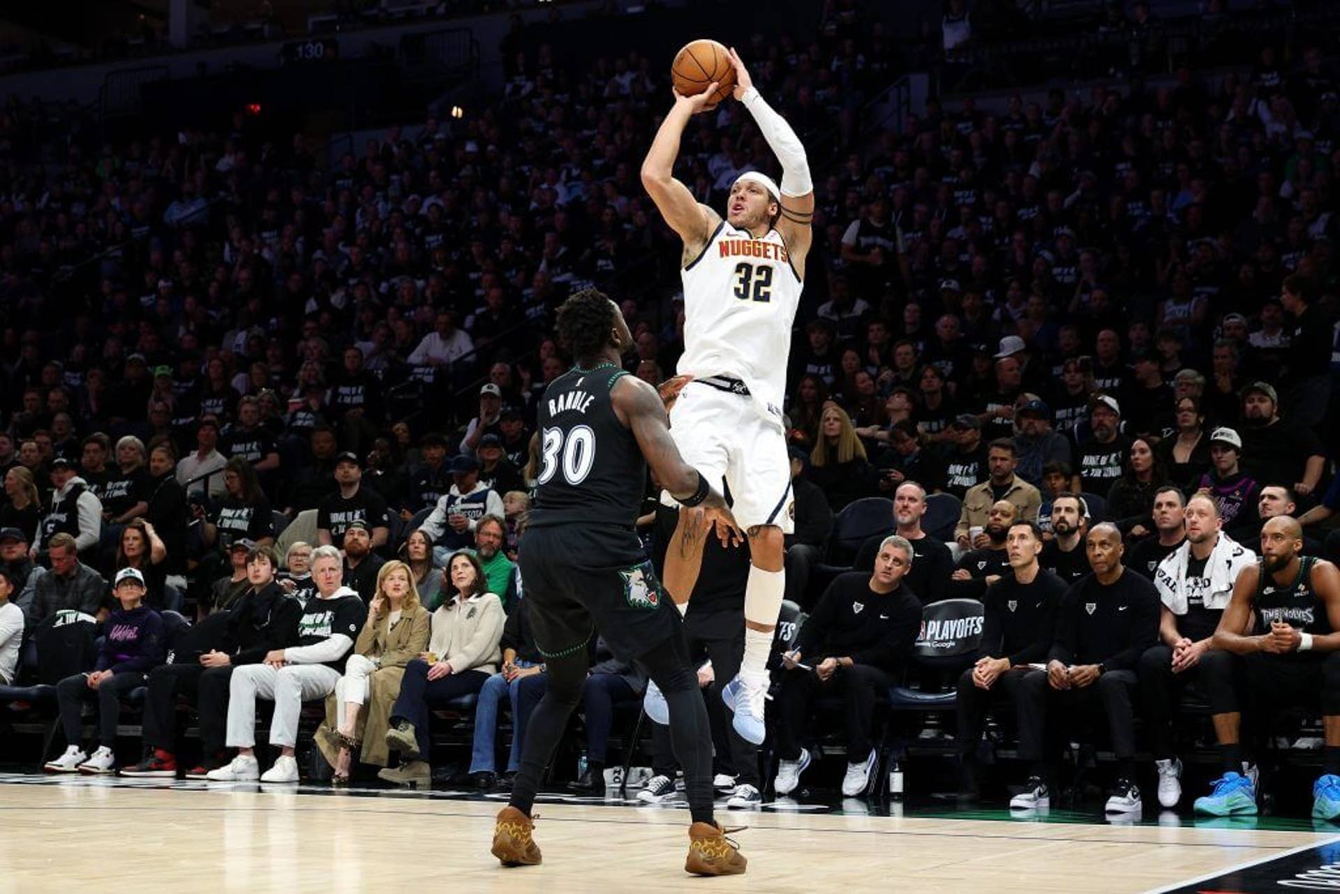 Aaron Gordon of the Denver Nuggets shoots the ball against Julius Randle of the Minnesota Timberwolves in the second quarter of Game Four of the First Round of the 2026 NBA Western Conference Playoffs at Target Center on April 25, 2026 in Minneapolis, Minnesota.