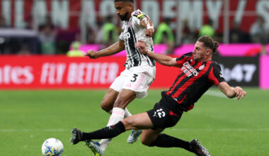 MILAN, ITALY - APRIL 26: Bremer of Juventus is challenged by Adrien Rabiot of AC Milan during the Serie A match between AC Milan and Juventus FC at Giuseppe Meazza Stadium on April 26, 2026 in Milan, Italy. (Photo by Marco Luzzani/Getty Images)