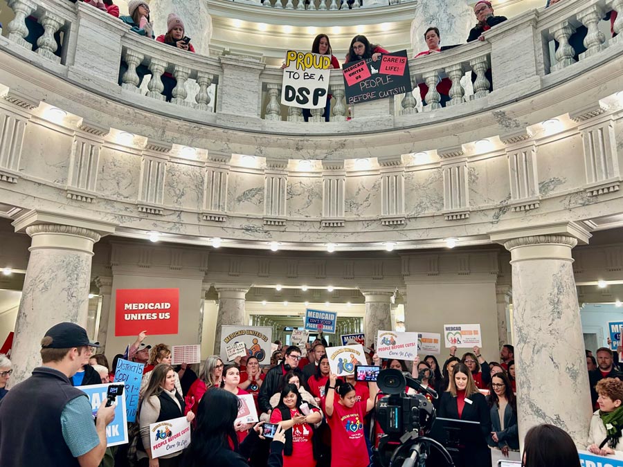 Hundreds of Idahoans gathered in the rotunda of the Idaho Capitol on Jan. 12, 2026, to protest proposed cuts to the state’s Medicaid program. The protest, organized by Idaho Voices for Children, took place before the governor’s State of the State Address.
