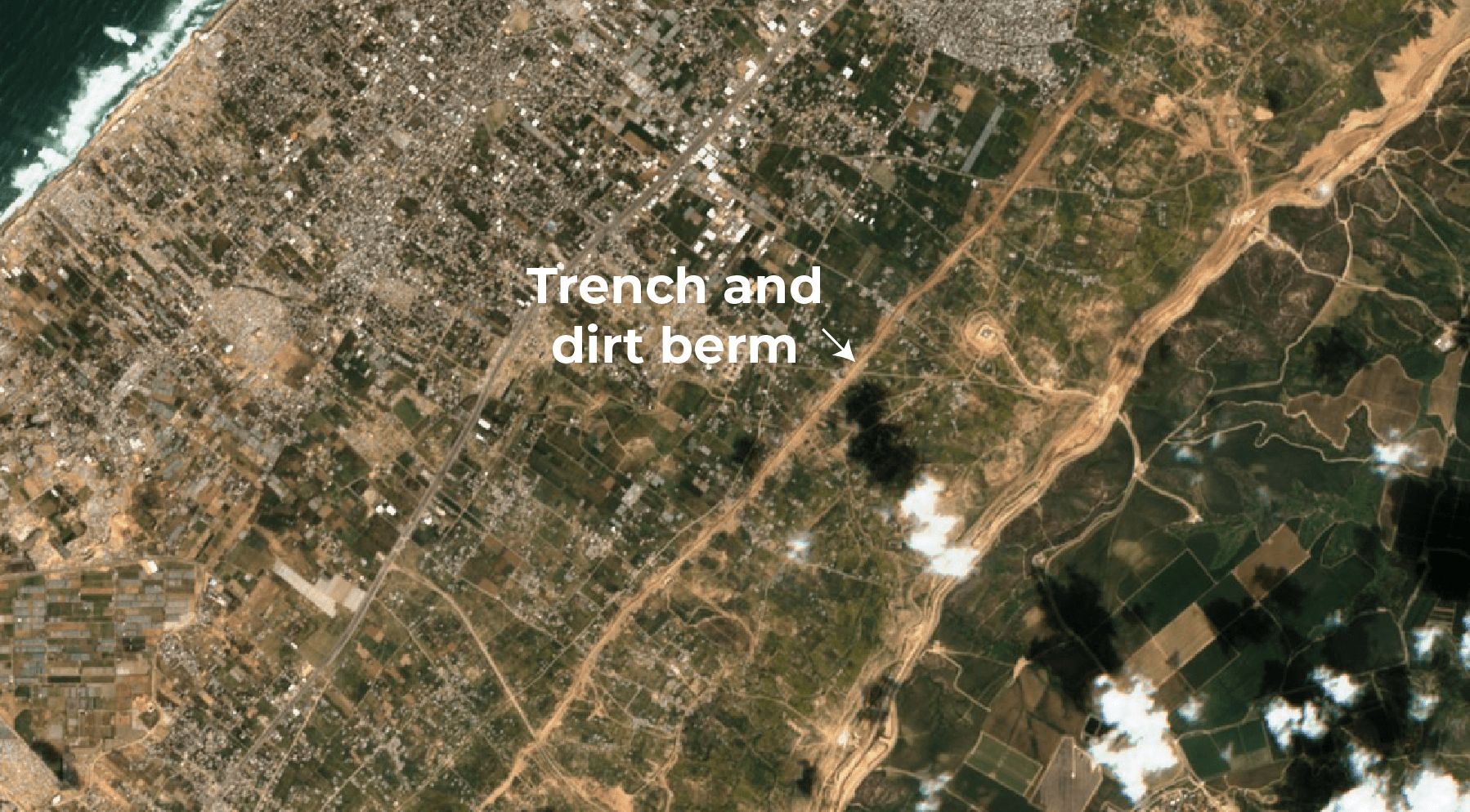 Traces of Israeli military vehicles are seen operating beyond the designated dirt berm in northern Gaza on March 10, 2026, in clear violation of ceasefire demarcations. [Al Jazeera/Sentinel Hub]