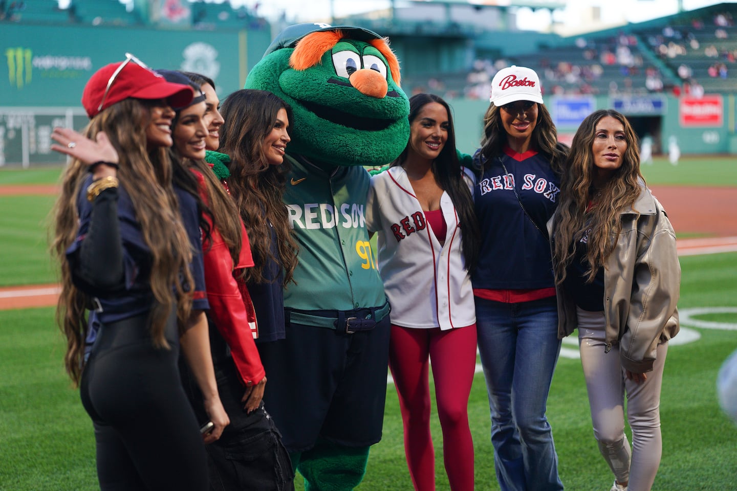 The cast of “The Real Housewives of Rhode Island" gathered for a photo before throwing out the ceremonial first pitch at Fenway Park on Friday.