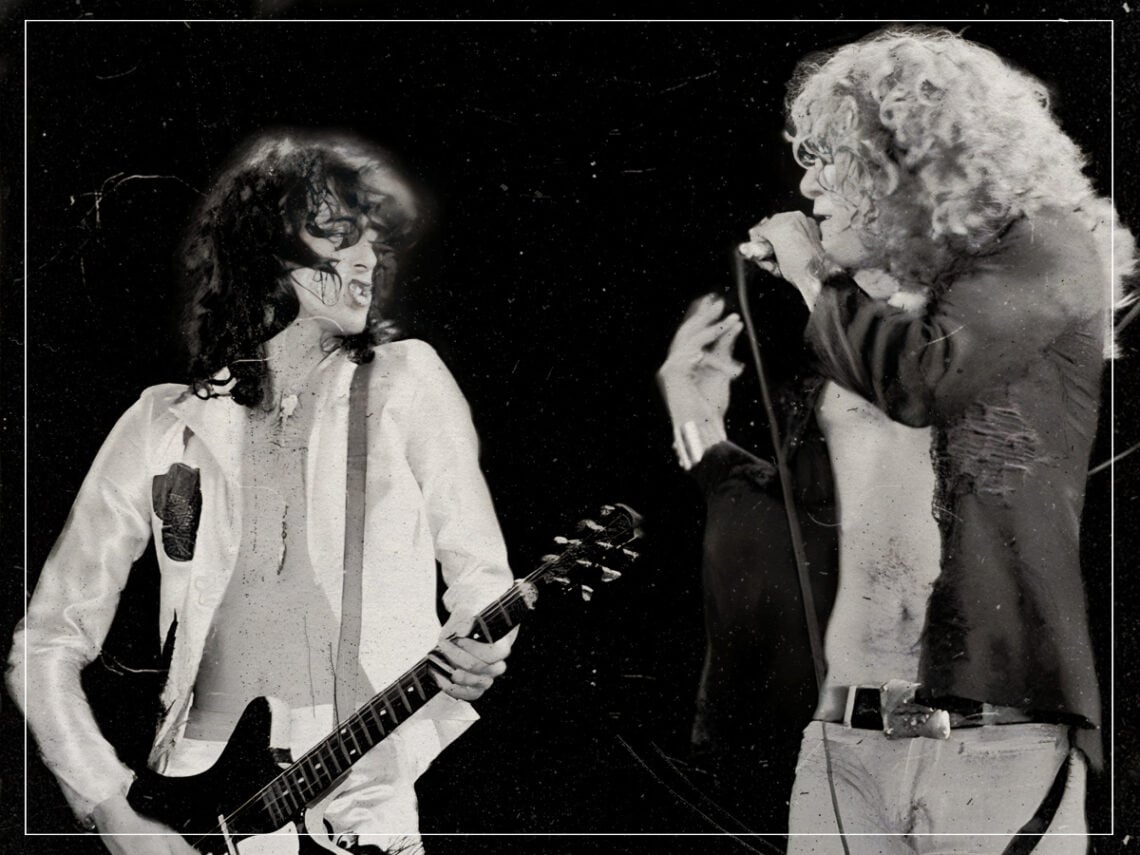 Jimmy Page and Robert Plant of Led Zeppelin onstage bare-chested at Madison Square Garden in New York City in 1977.