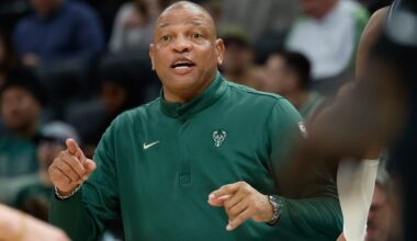 Doc Rivers coaches from the sidelines.