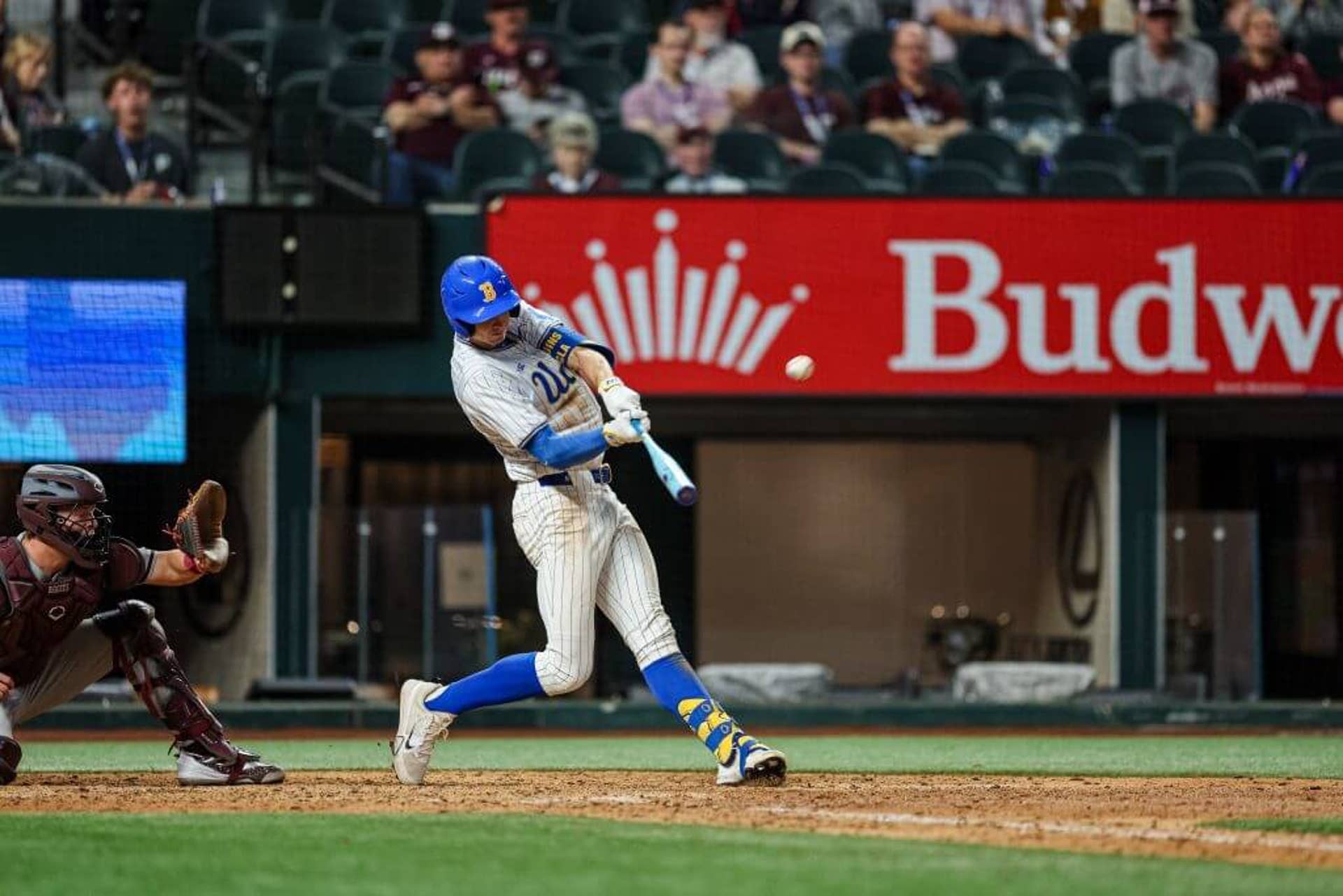 Will Gasparino hits the ball in an early-season UCLA game.