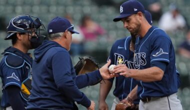 Tampa Bay Rays manager Kevin Cash, second from left, takes the ball from starting pitcher Steven Matz, front right, during the sixth inning of a baseball game against the Chicago White Sox in Chicago, Thursday, April 16, 2026. (AP Photo/Nam Y. Huh)