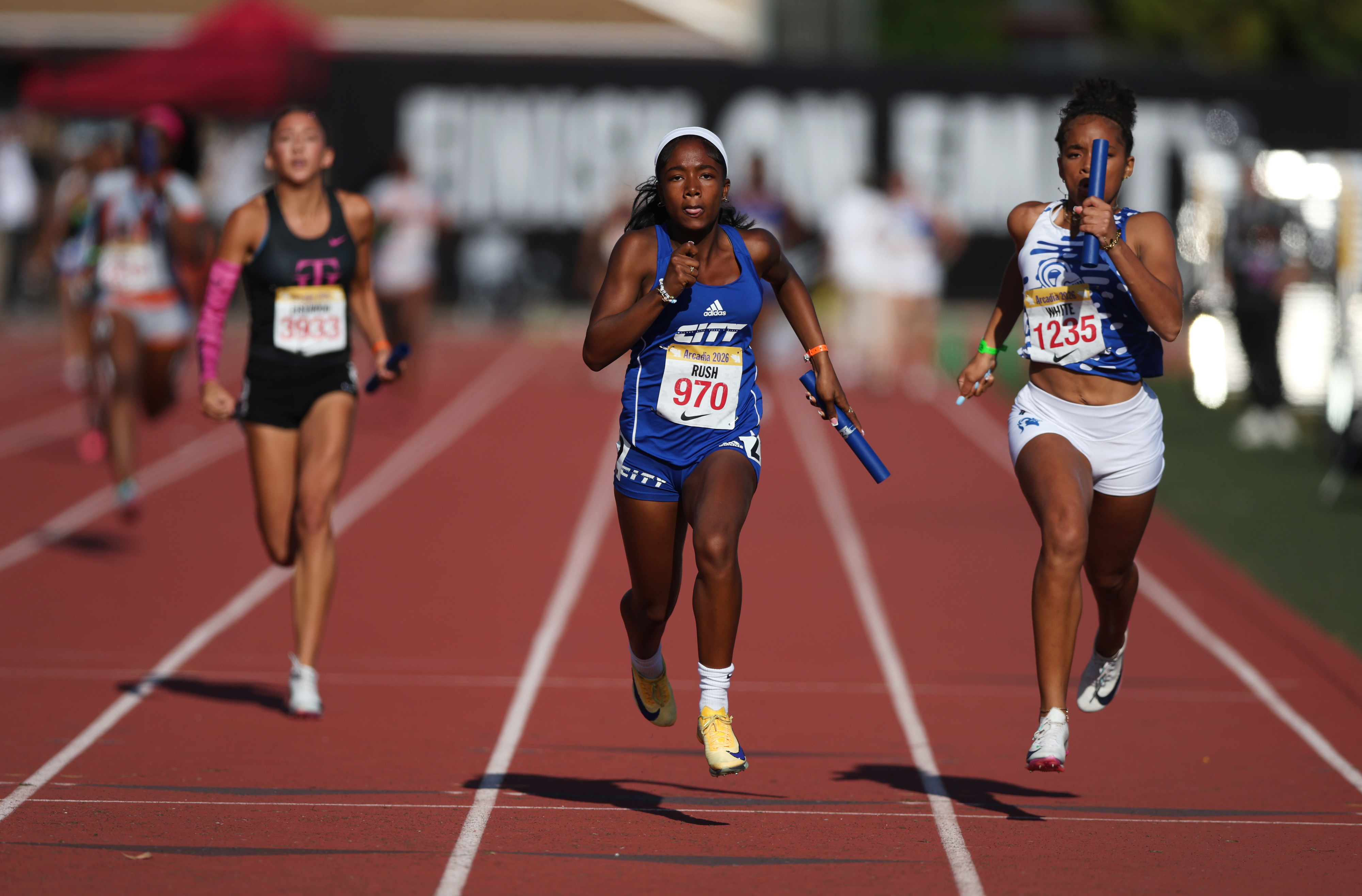 Culver Cityâs Nadhari Goodwin, center, races through the final stretch...