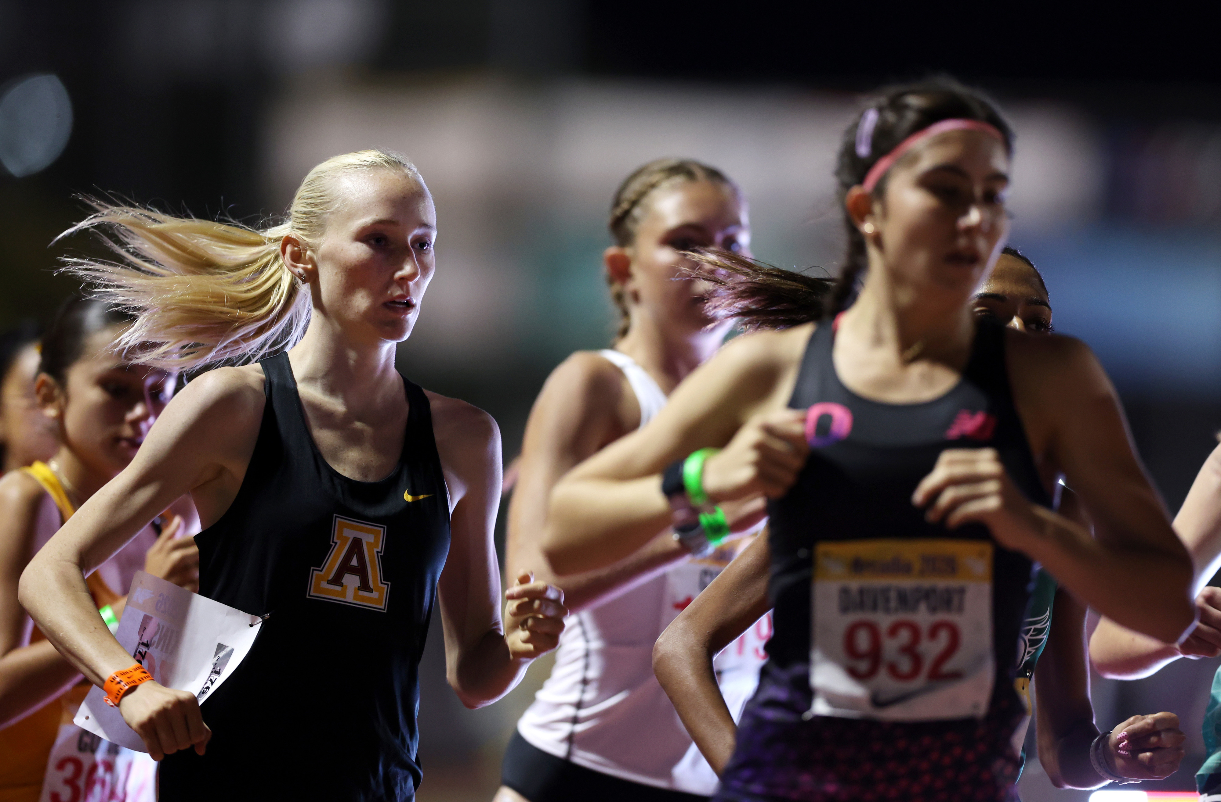 Arcadiaâs Charlotte Hopkins, left, competes in the girls 3,200 meter...