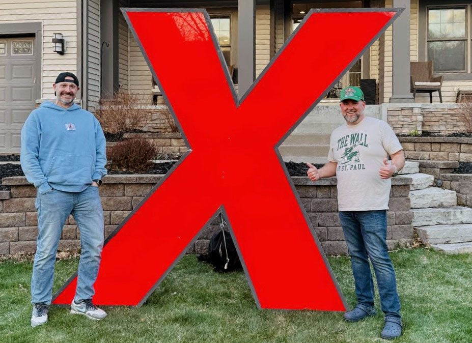 Wild fan bought "X" from Xcel Energy Center sign