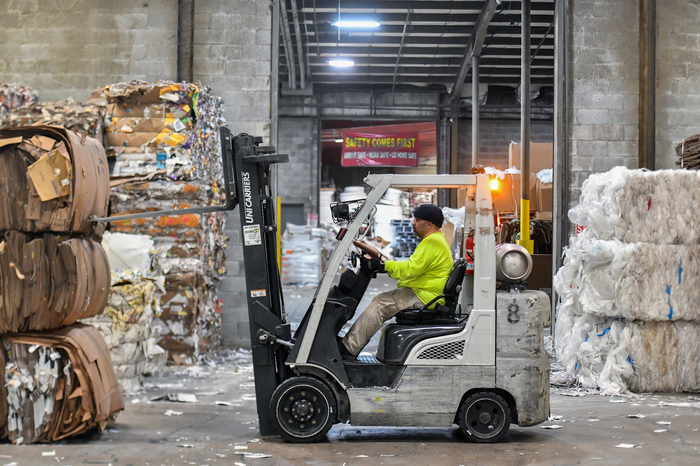 Employee Ben Ramos operates a forklift in a warehouse at...