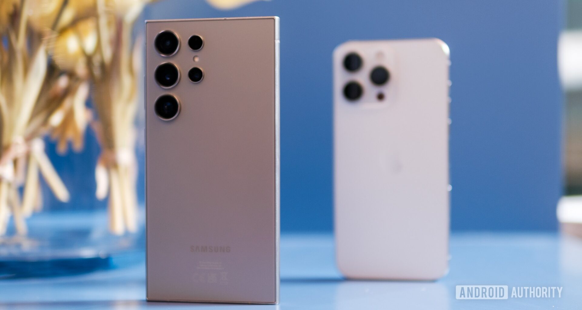 Samsung Galaxy S24 Ultra vs Apple iPhone 15 Pro Max background