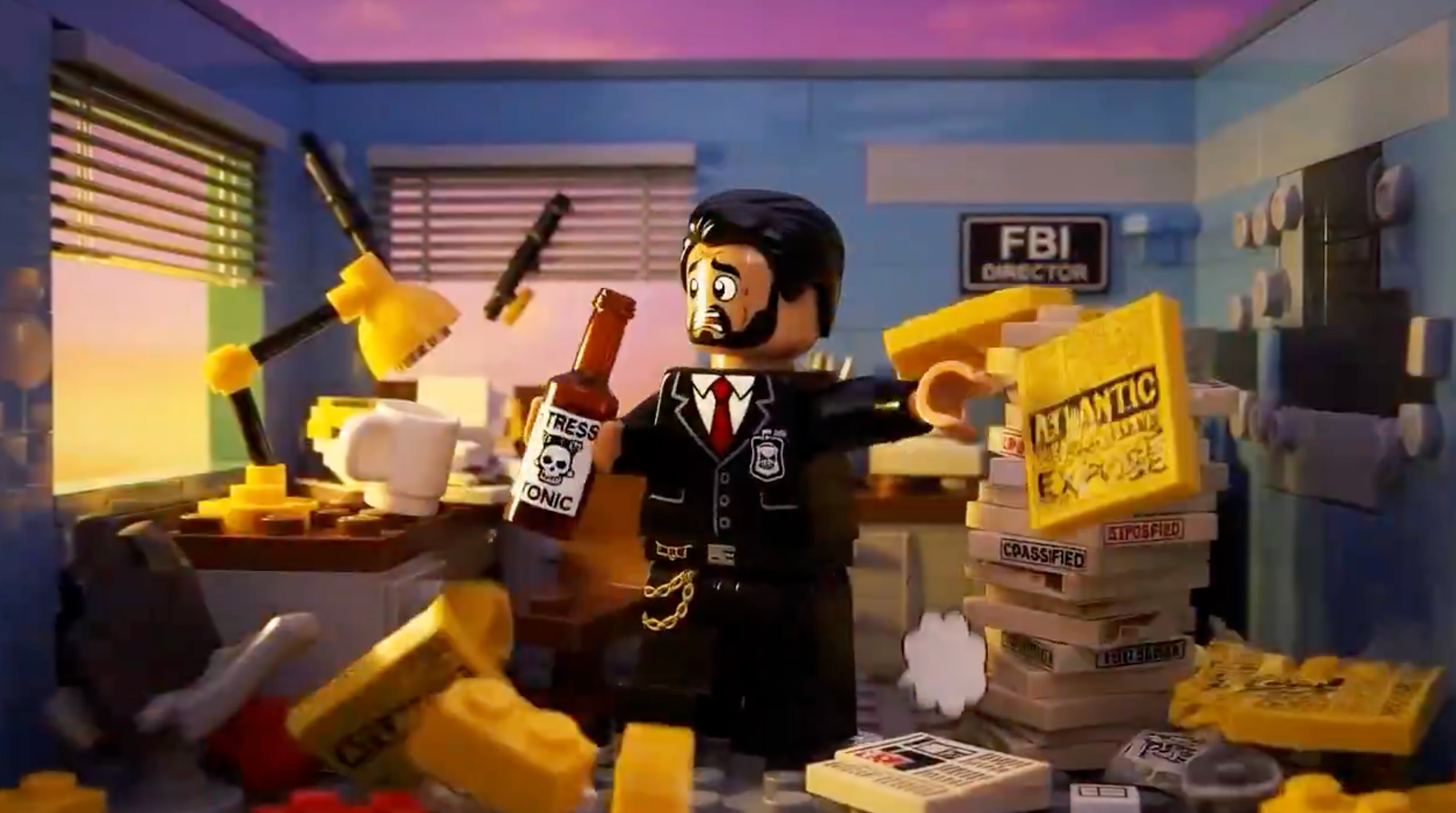 FBI Director Kash Patel is the target in a new AI-Lego video making the rounds on the internet. In one scene, Patel is depicted in his office, holding a ‘Stress Tonic’ beverage while surrounded by a mess of papers.