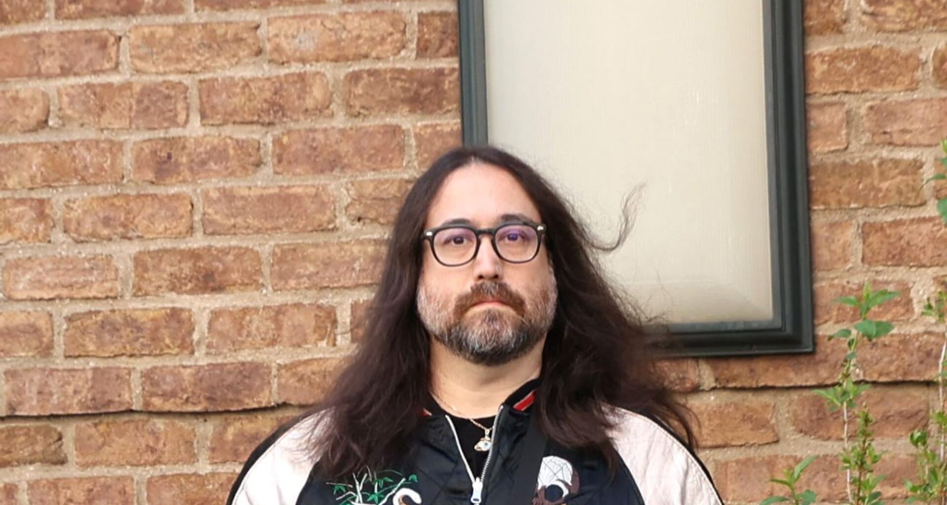 “Zero Irony”: Son of John Lennon and Yoko Ono Defends Photo of Famous Parents With Maid