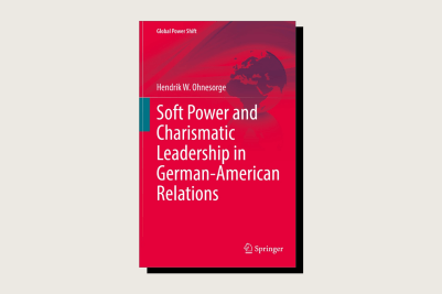 The book cover features a solid red background with the title in large white text and a faint graphic of a globe at the top. The book is part of the "Global Power Shift" series.