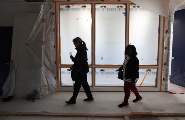 Asian American Pacific Islander Coalition of North Bay vice president Grace Cheung-Schulman, left, and CEO of North Bay Black Chamber of Commerce Nancy Rogers tour the second floor of offices under construction at BOSS in Santa Rosa on Wednesday, January 14, 2026. (Christopher Chung/The Press Democrat)
