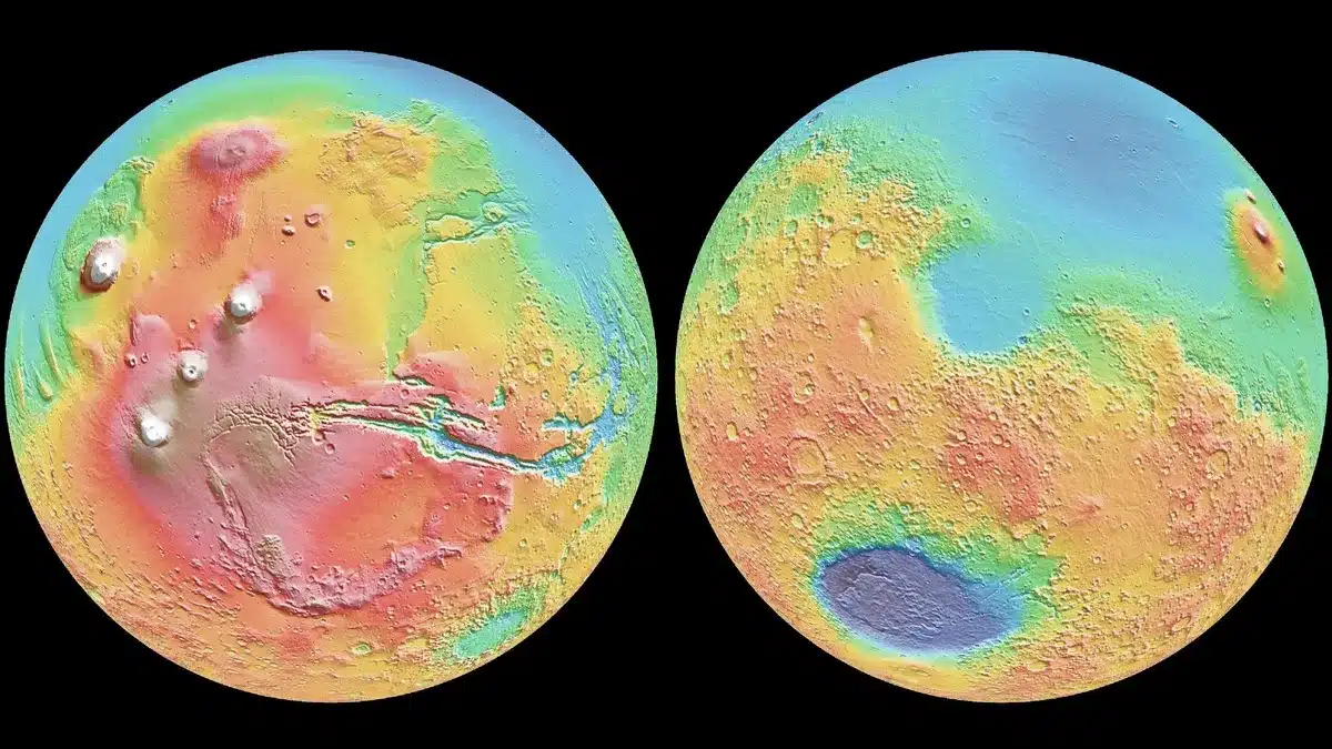 This Topographic Map Of Mars Shows Its Varying Elevations, With Red Areas Representing Higher Elevations And Blue Indicating Lower Region