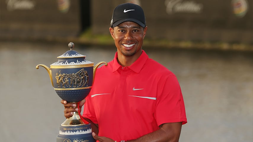 Tiger Woods poses after his two-stroke victory at the 2013 World Golf Championships-Cadillac Championship at the Trump National Doral Miami. (Warren Little/Getty Images)