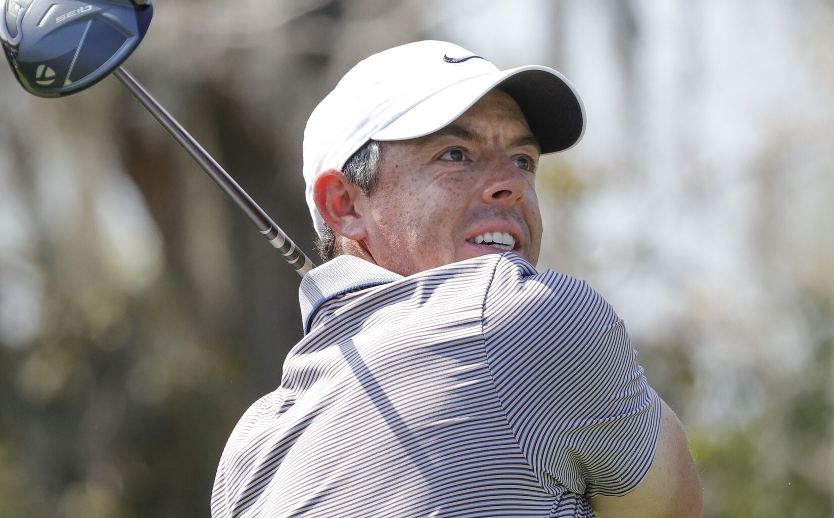 Mar 8, 2025; Orlando, Florida, USA; Rory McIlroy plays his shot from the third tee during the third round of the Arnold Palmer Invitational golf tournament at Bay Hill.