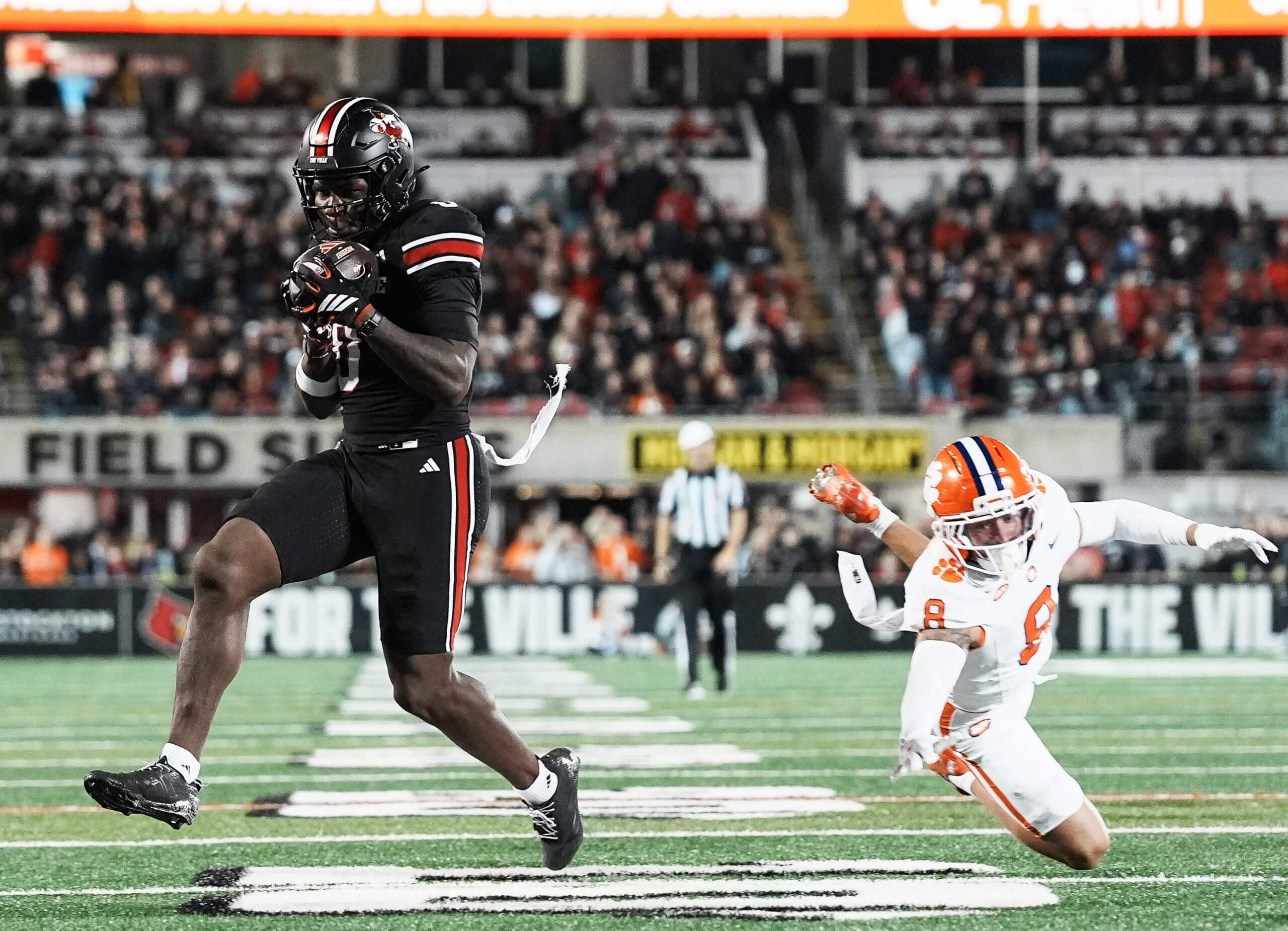 Louisville Cardinals wide receiver Chris Bell got close to the end zone but officials ruled against his touchdown after a replay review.