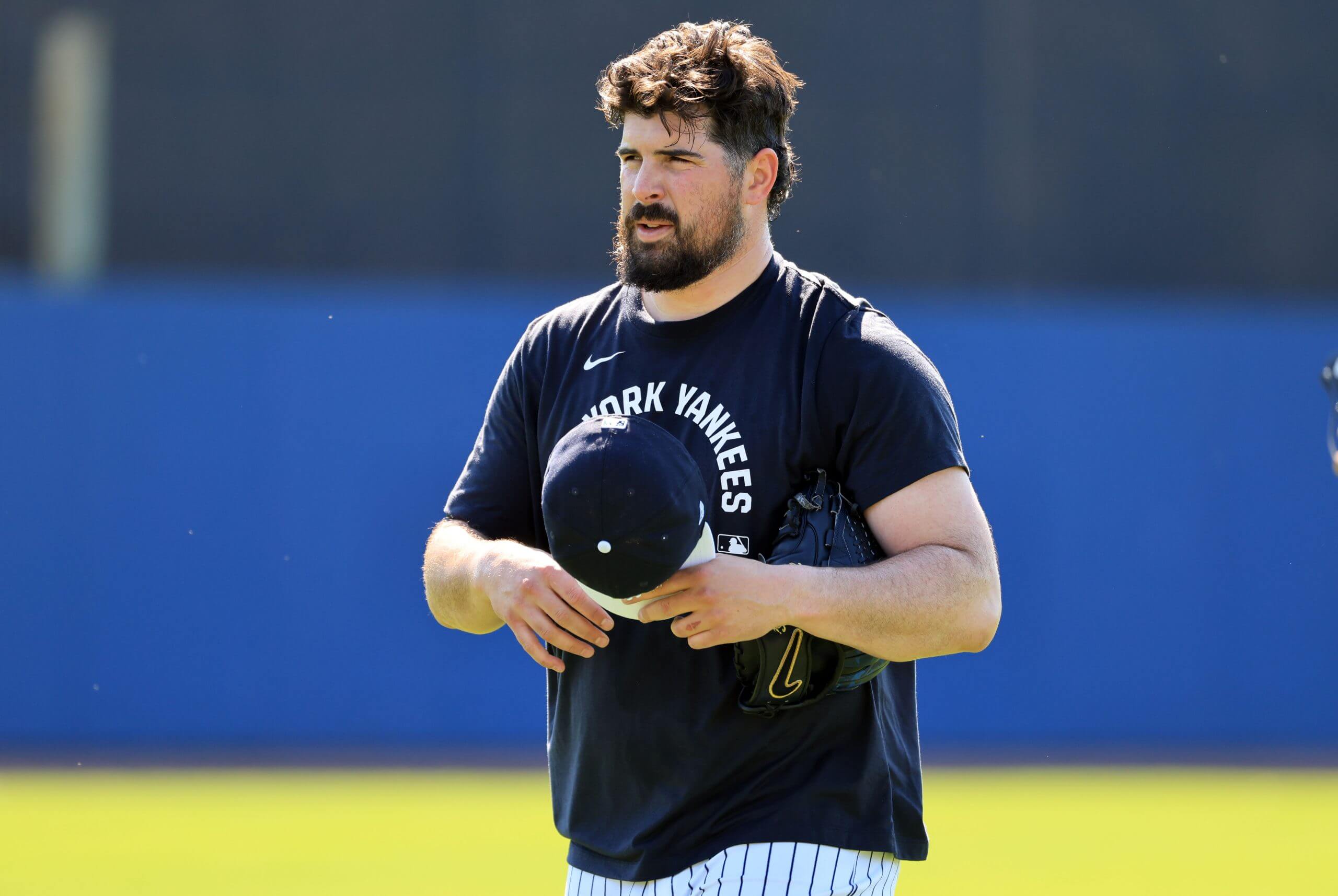 New York Yankees pitcher Carlos Rodon (55) works out during spring training practices at George M. Steinbrenner Field.
