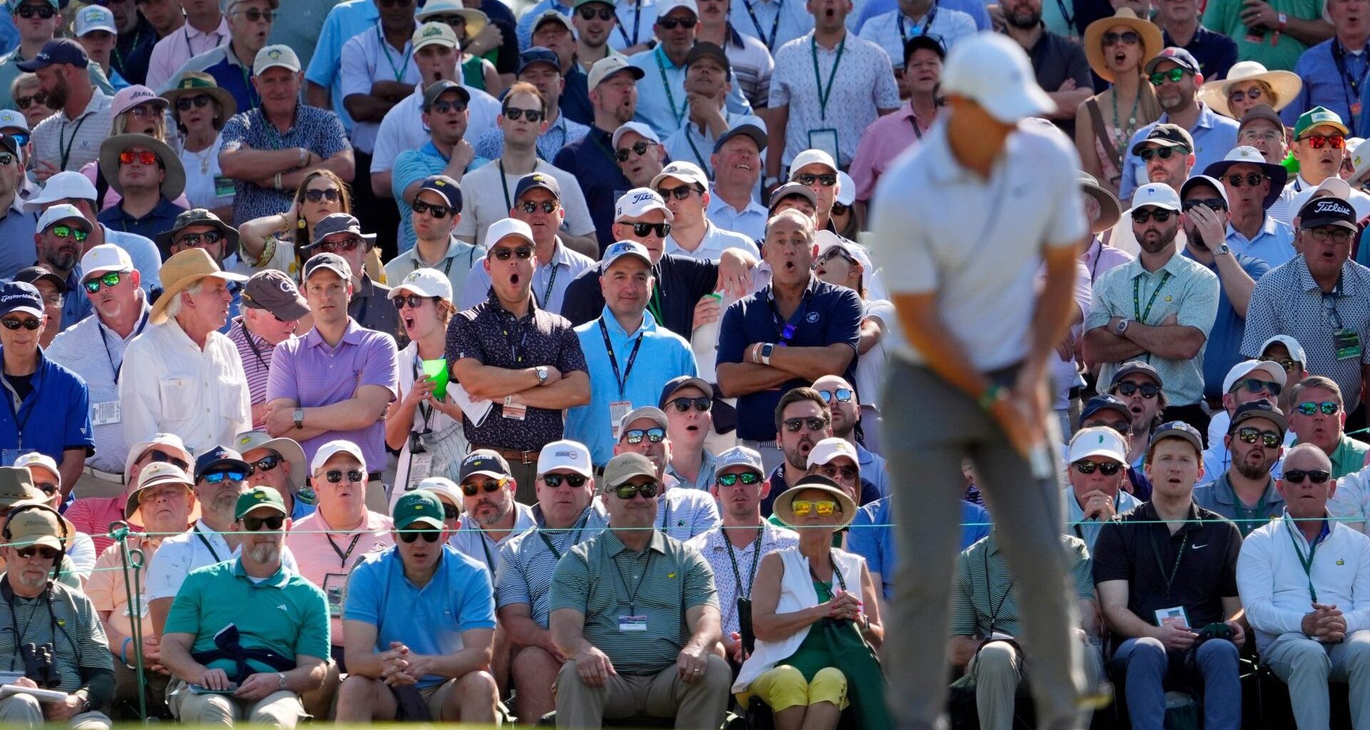 Apr 10, 2026; Augusta, Georgia, USA; Patrons react after Rory McIlroy's first putt on the 10th green during the second round of the Masters Tournament at Augusta National Golf Club. Mandatory Credit: Katie Goodale-Imagn Images