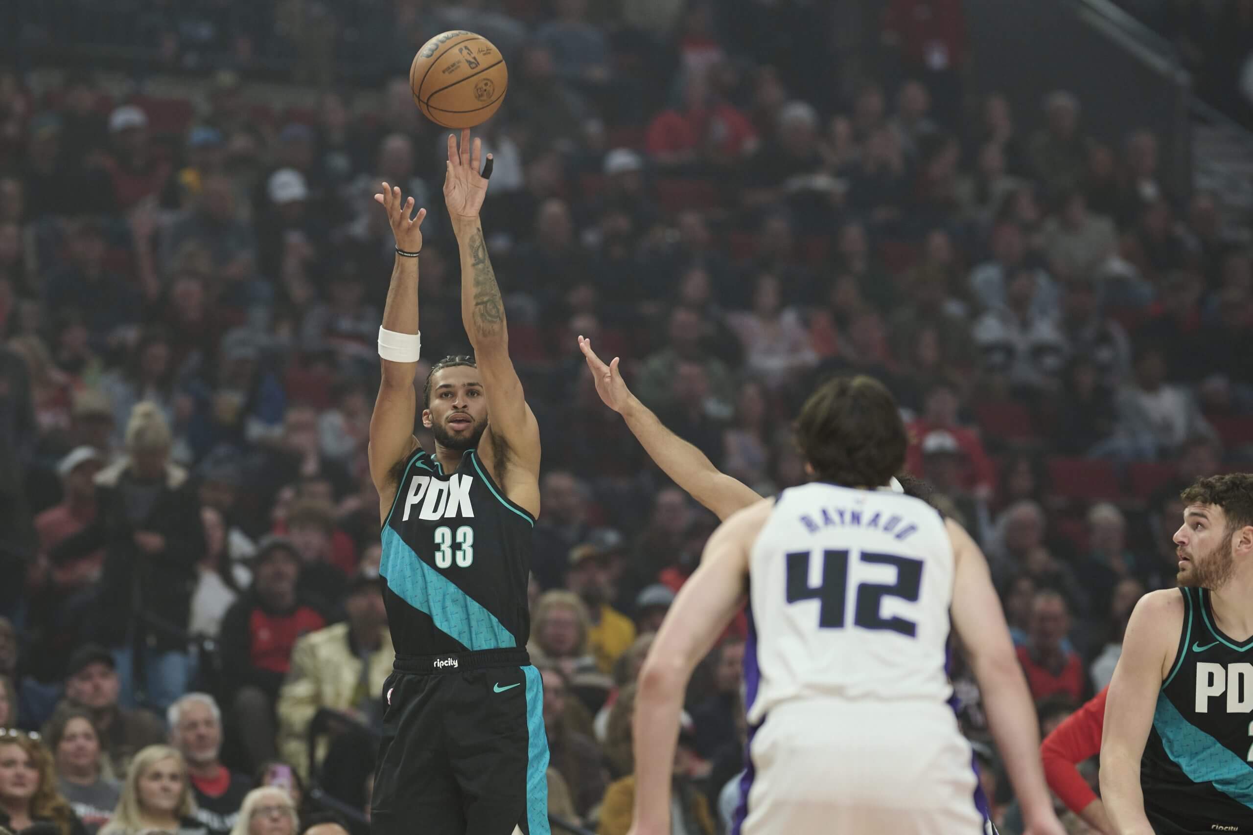 Toumani Camara shoots against the Kings