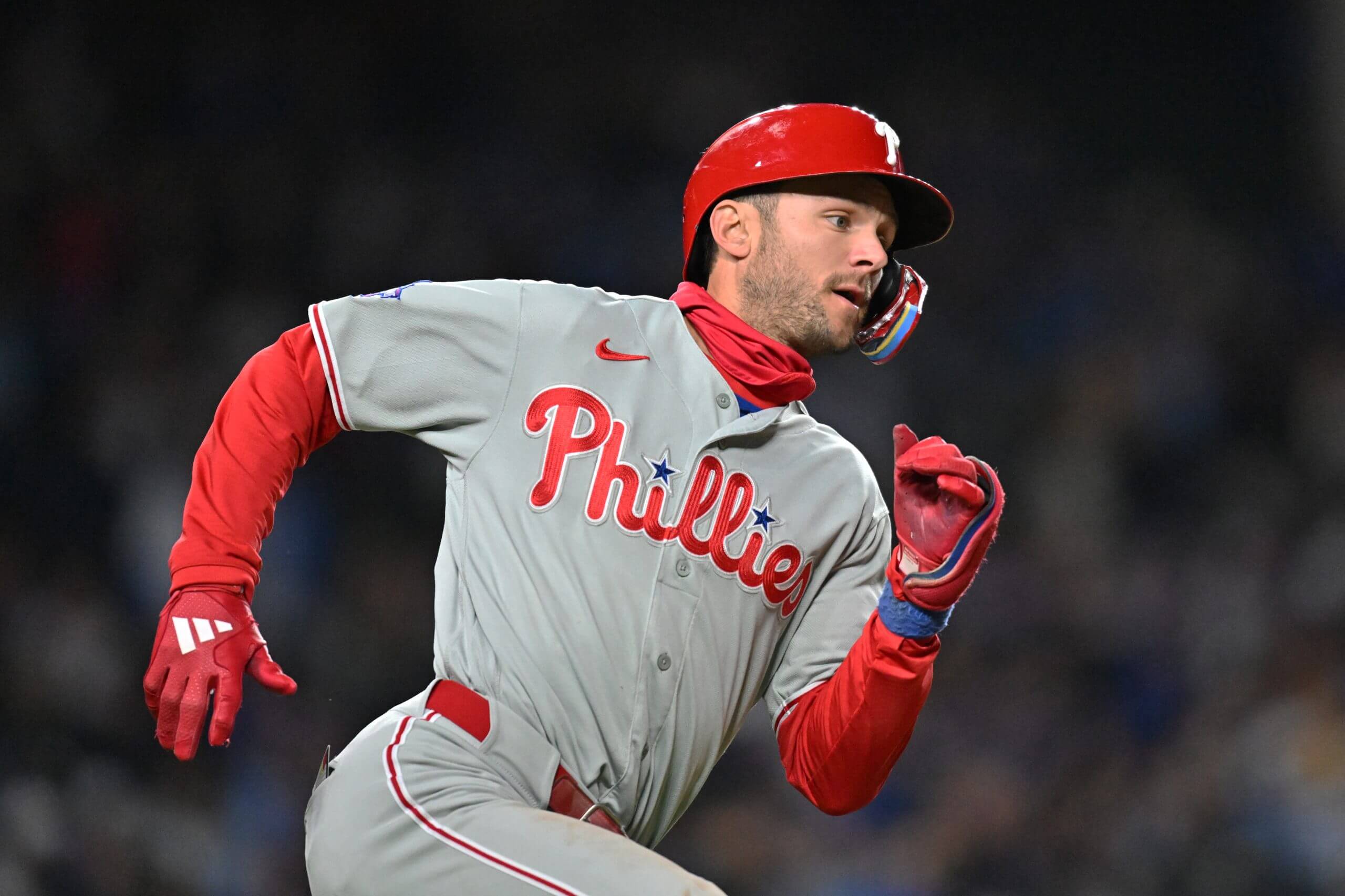 Philadelphia Phillies shortstop Trea Turner runs after hitting a double.